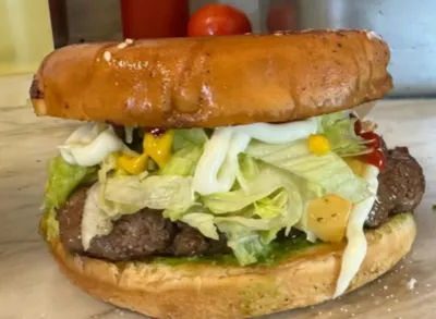 Plain Cheeseburger from Lonches Sota, a simple cheeseburger.